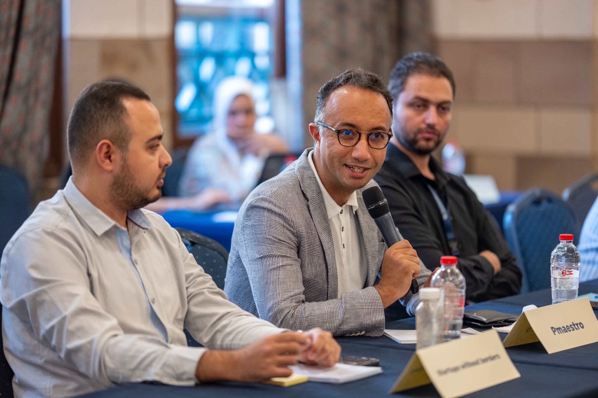 A panel discussion with 3 participants 