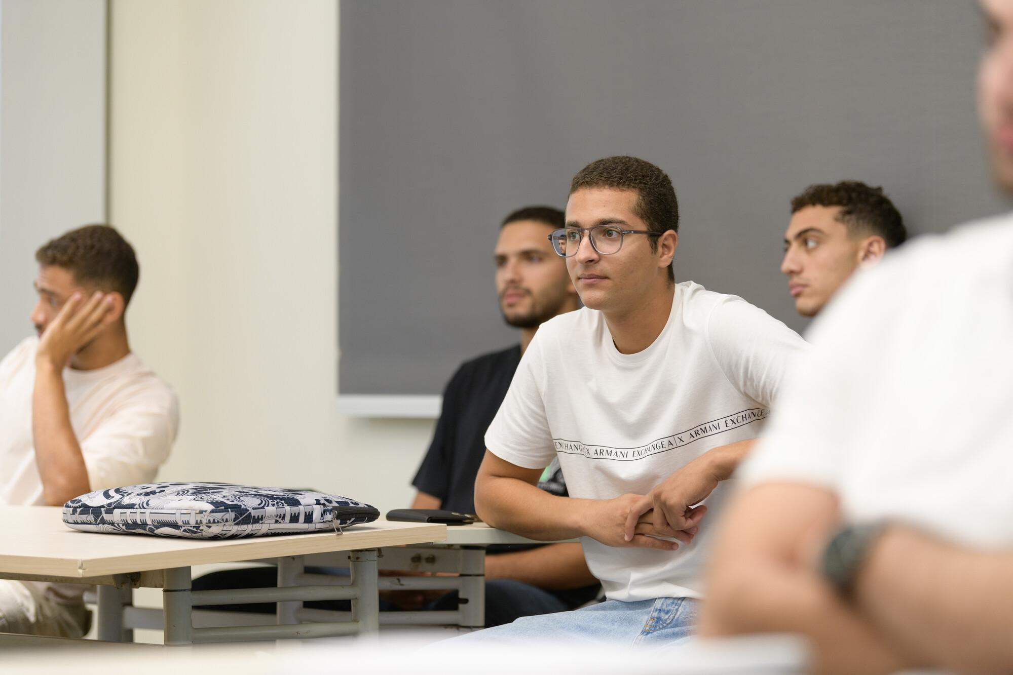 students attending class and concentrating