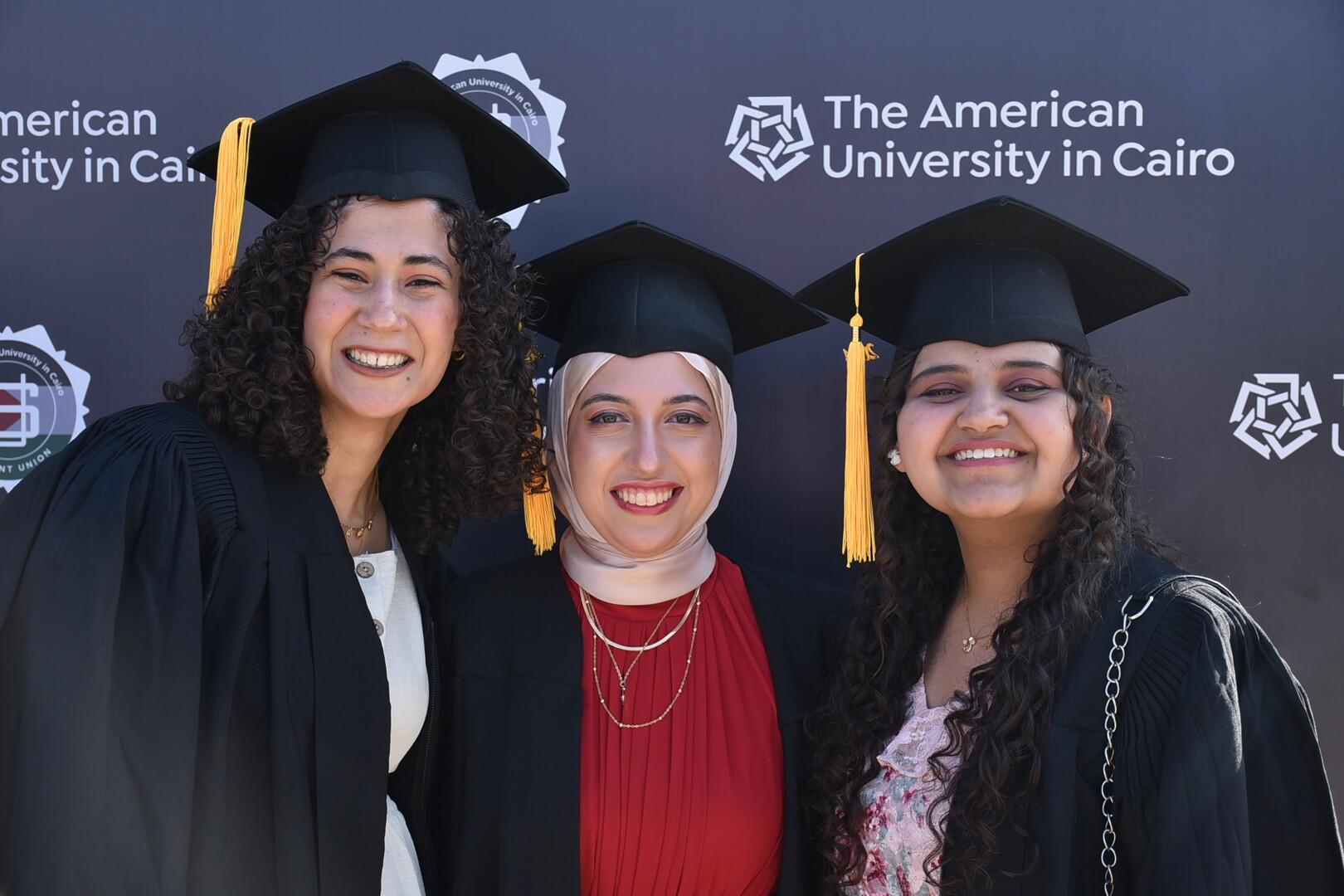 graduating students in cap and gown in commencement 