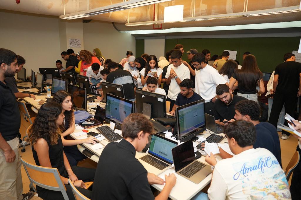 students working together in a competition setting in class