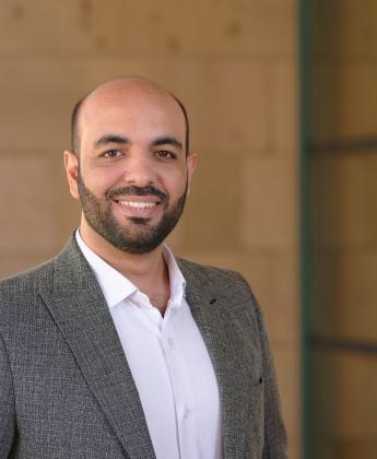 Ahmed Gowida in a suit