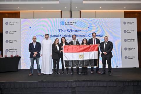 group of students from school of business group photo winning an award