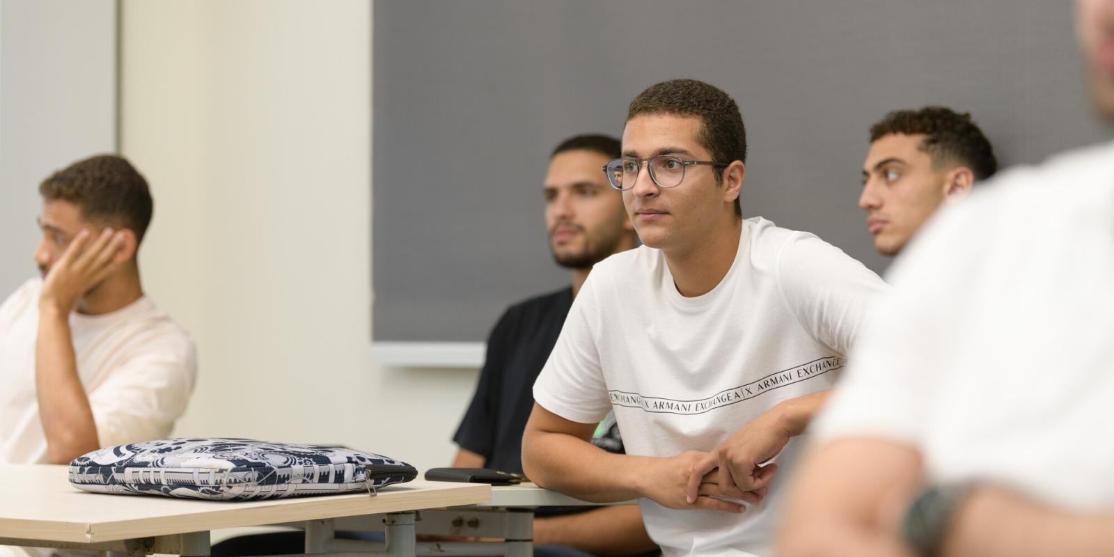 students attending class and concentrating