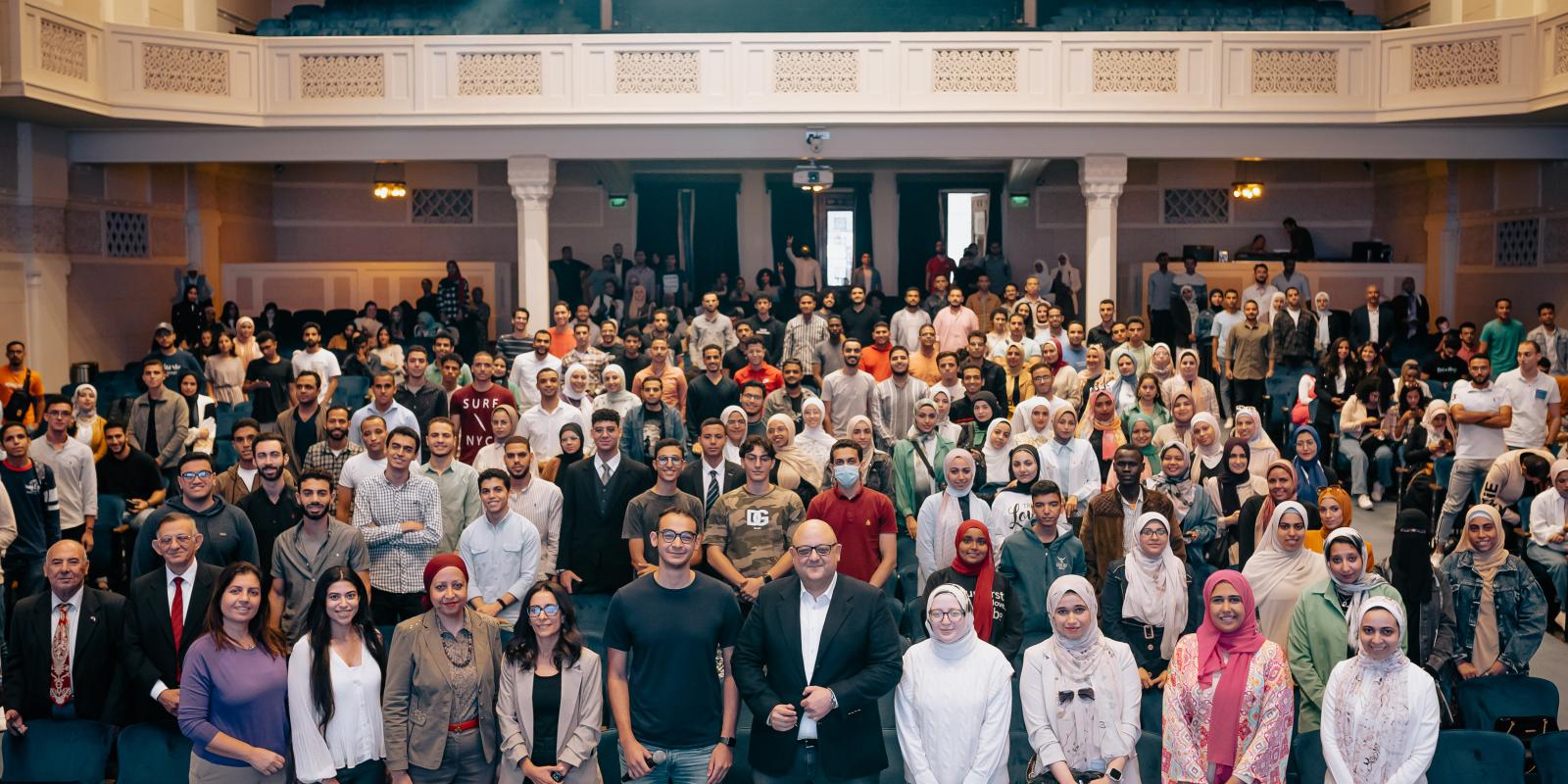 group photo of CEI event with all attendees in ewart hall