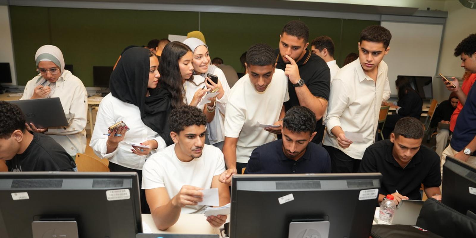 students working in classroom on project 