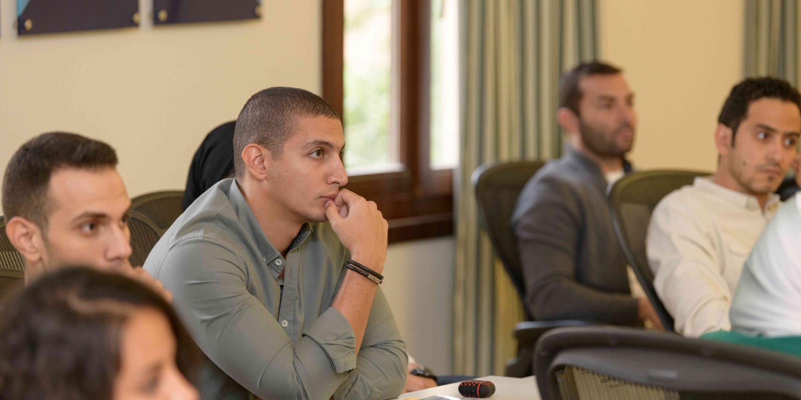 Graduate student sitting in a classroom