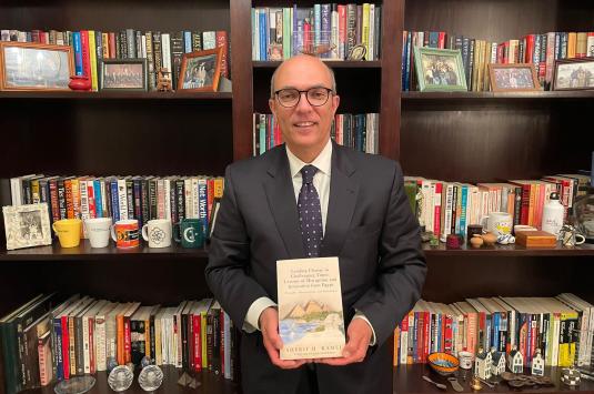 Sherif Kamel holds his debut book