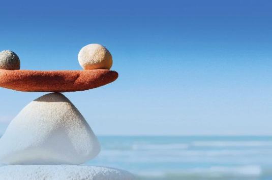 Stones on top of each other in the water
