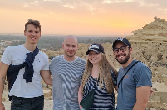 Students stand in front of Siwa