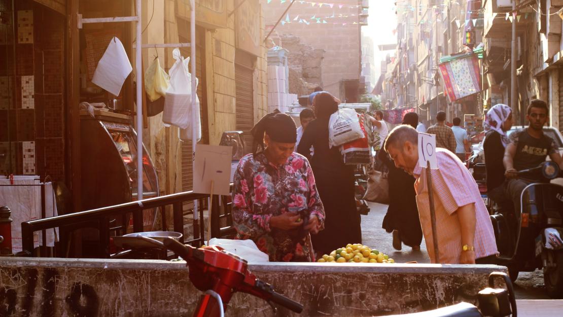 Photo of a Woman Selling Lemons in Cairo