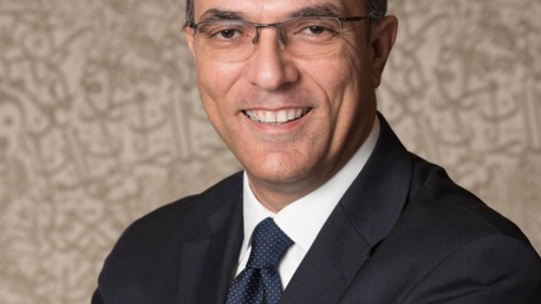 Dean Sherif Kamel smiling to the camera