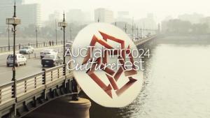 Cars crossing on a bridge over the Nile. Text: AUC Tahrir CultureFest 2024 in front of the AUC star