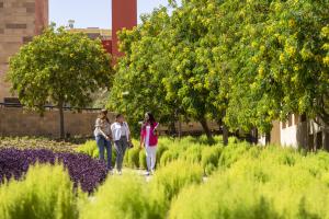 students walking in the garden