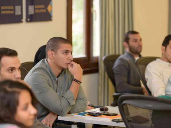 Graduate student sitting in a classroom