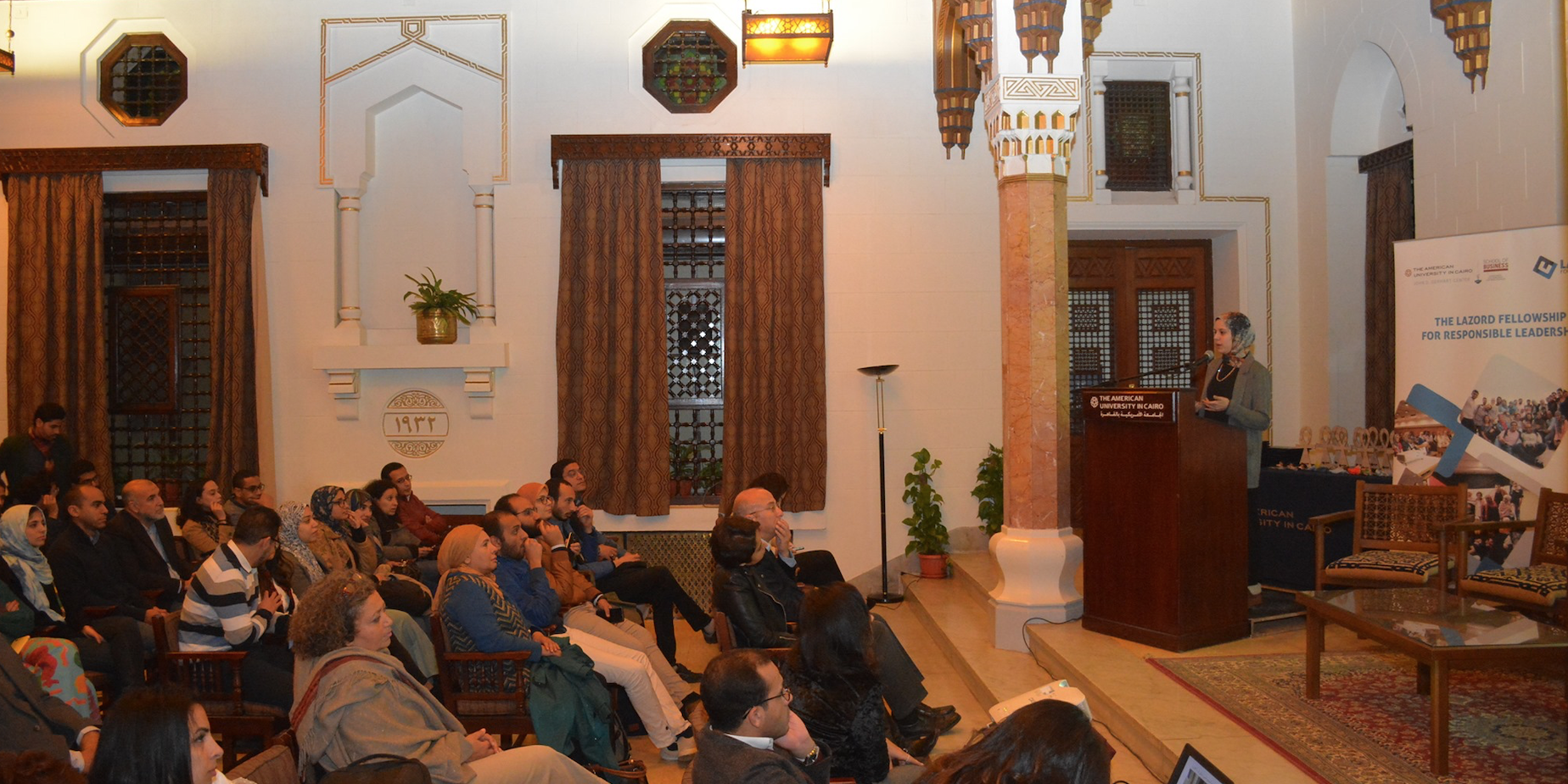 Shama giving a speech at the Lazord Fellowship graduation ceremony