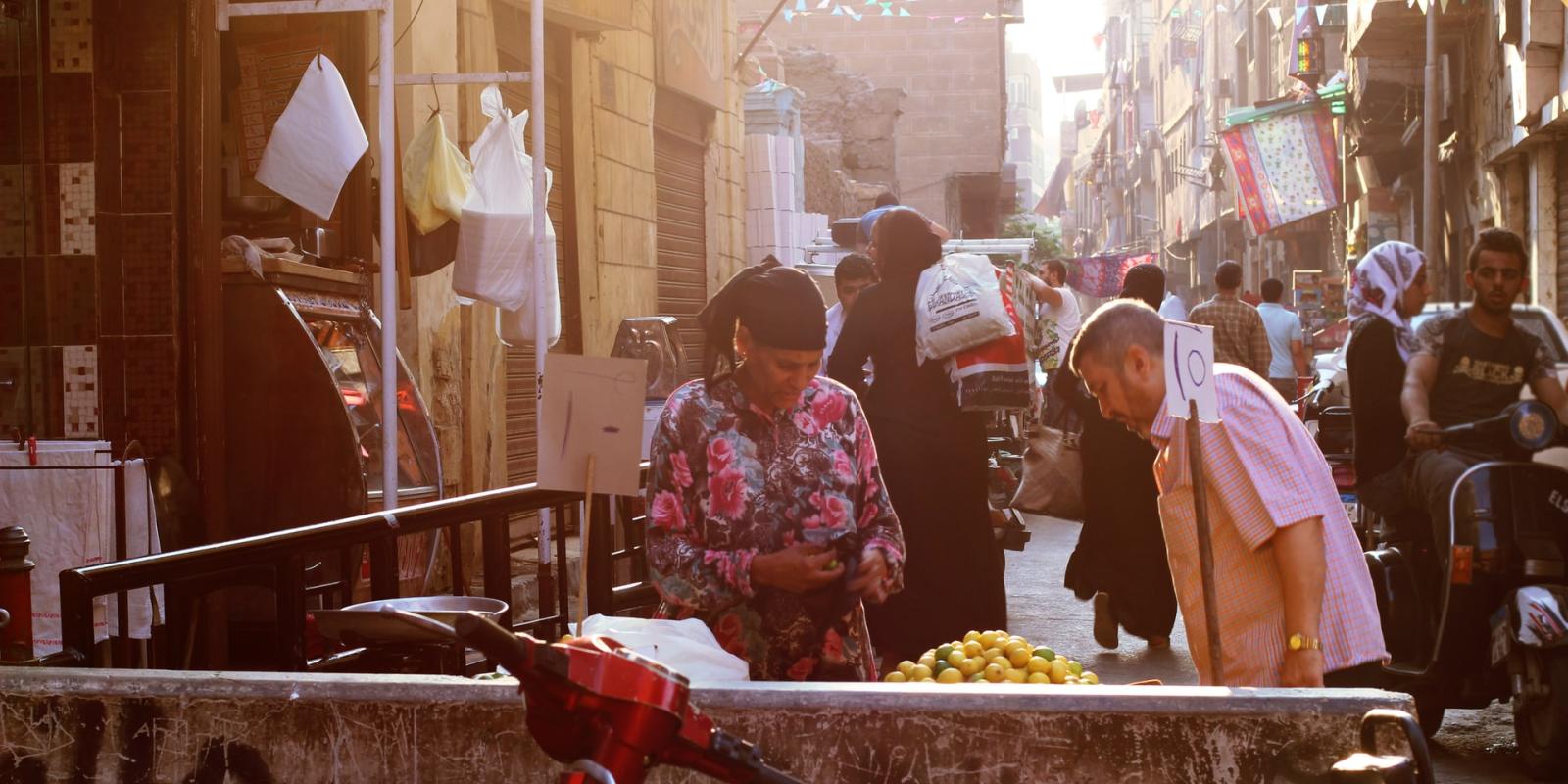 Photo of a Woman Selling Lemons in Cairo